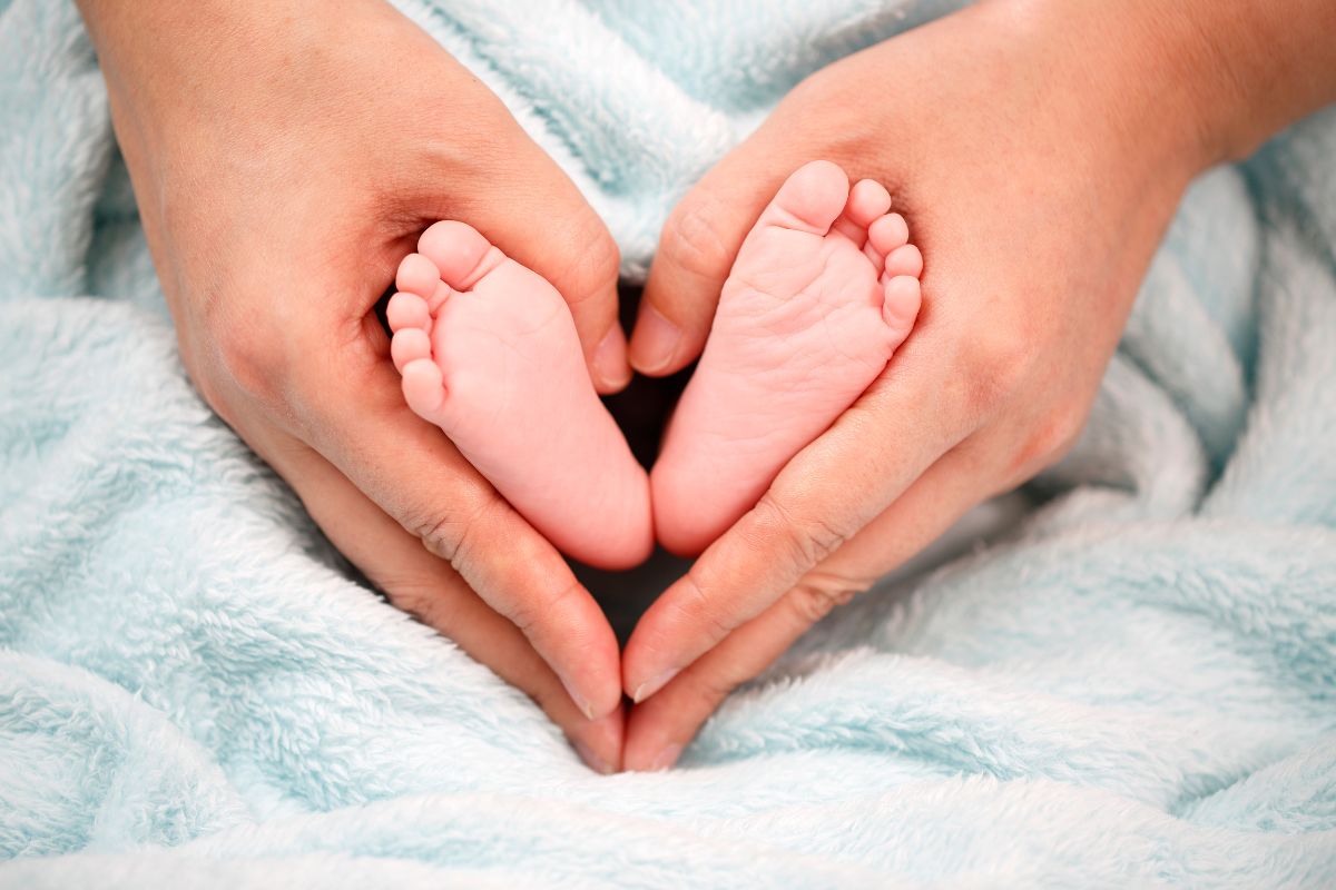 hands with baby feet